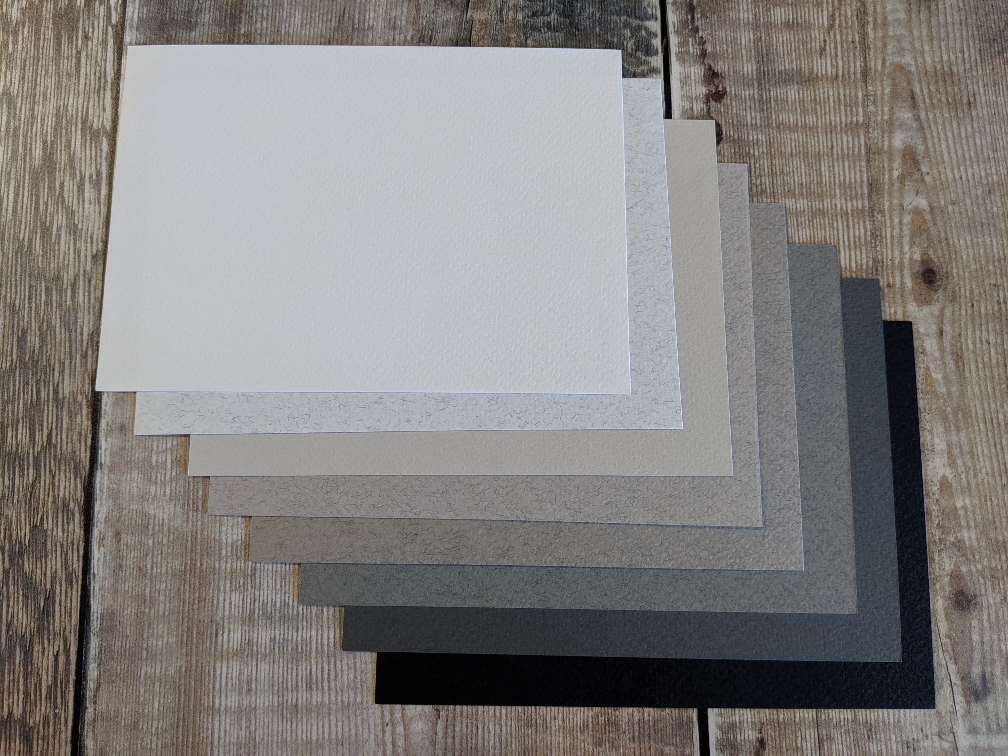 8  Layered pack of Greyscale Tiziano colours Hammered 160 gsm paper A4