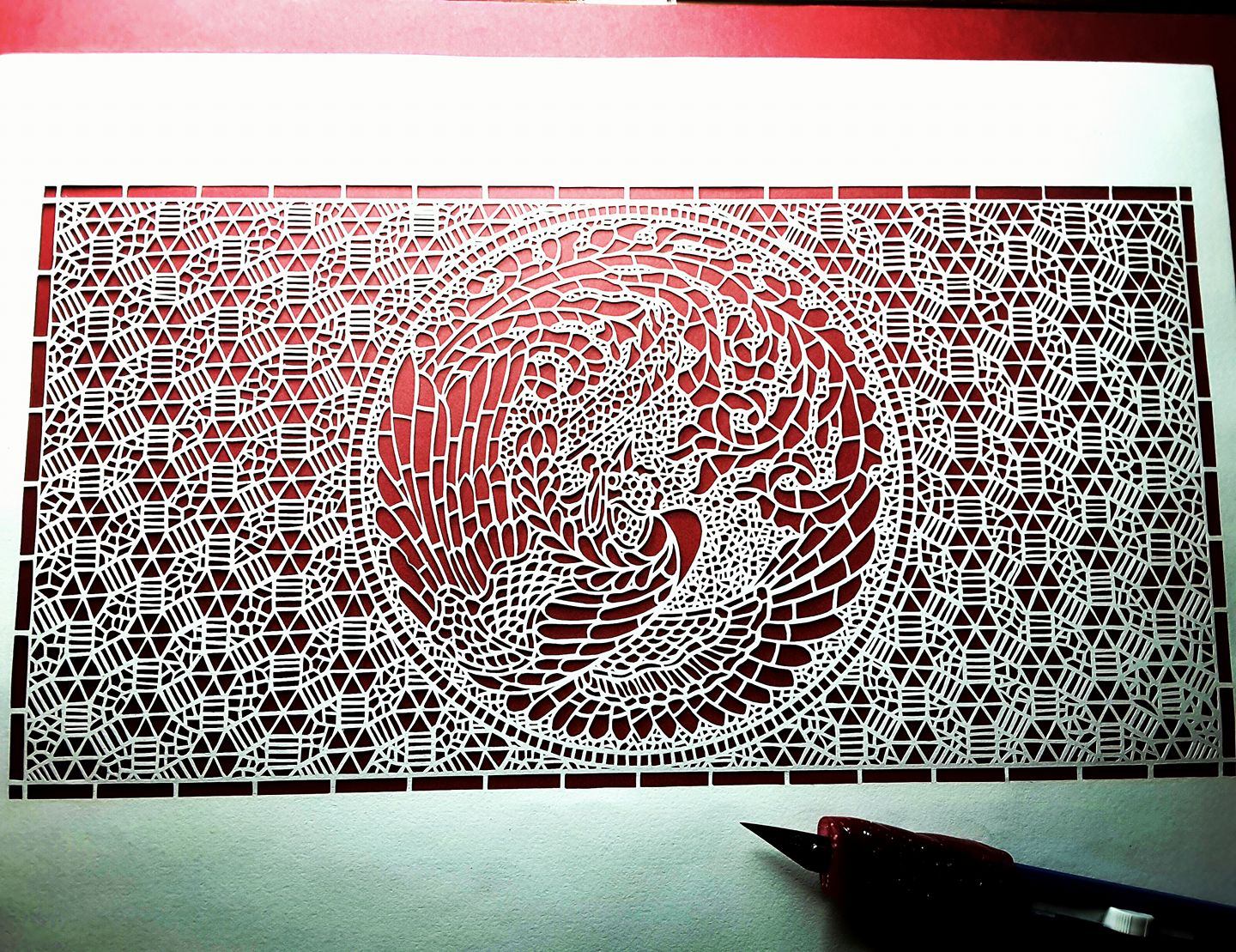 white paper cut by April shepherd, using paperstory cotton paper