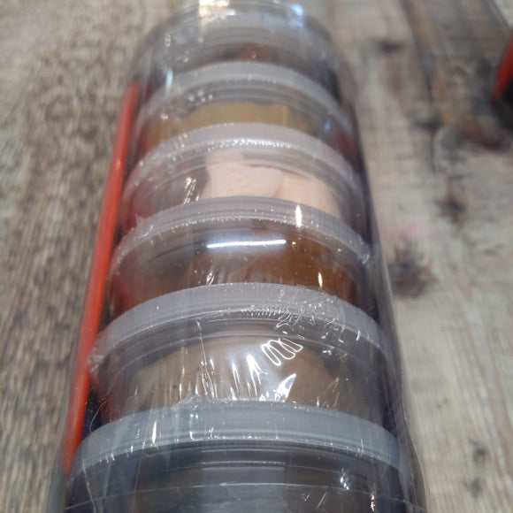 Silk clay use for needle felting sculpture for adding features to characters