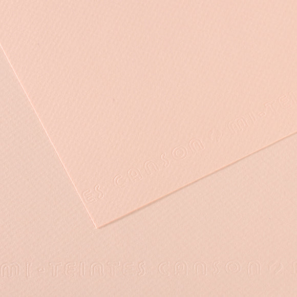 Light pink paper with 'Canon' branding on a matching background
