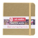 Sketch book with a gold cover and white label on a white background