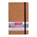 Cork notebook with a visible brand label on a white background