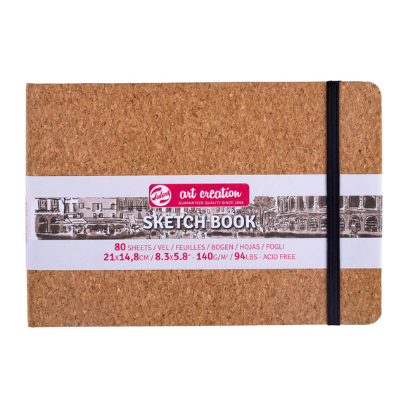 Cork sketchbook with a visible brand label on a white background