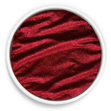 Red textured material swatch in a circular frame on a white background