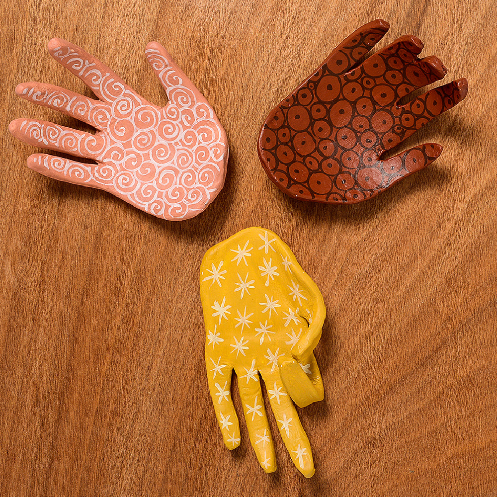 Hands made with terracotta dad air drying clay