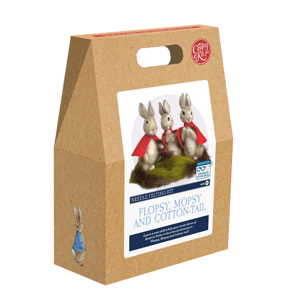 Kraft paper gift box with 'Flopsy, Mopsy and Cotton-tail' needle felting kit on a white background