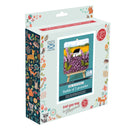 Packaging of a needle felting kit with a scenic design on a white background