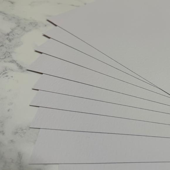 a fan of zeta hammered textured card