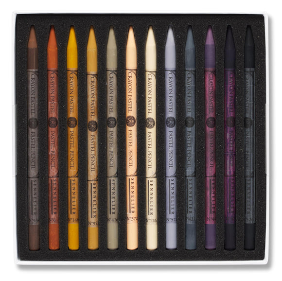 Set of Le Penille pastel pencils in various colors in a black box.