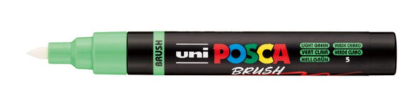 uni POSCA brush marker with green cap on a white background