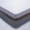 Close-up of a white paper book with cork cover
