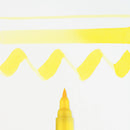 Yellow marker pen with yellow wavy line on white background