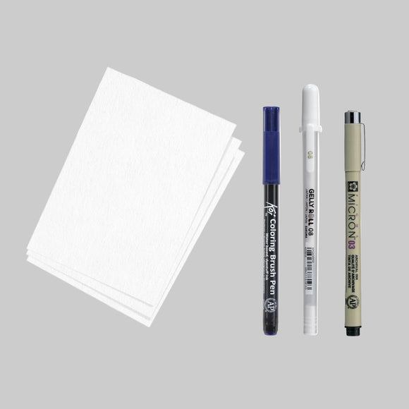 Set of drawing tools including pens and paper on a white background