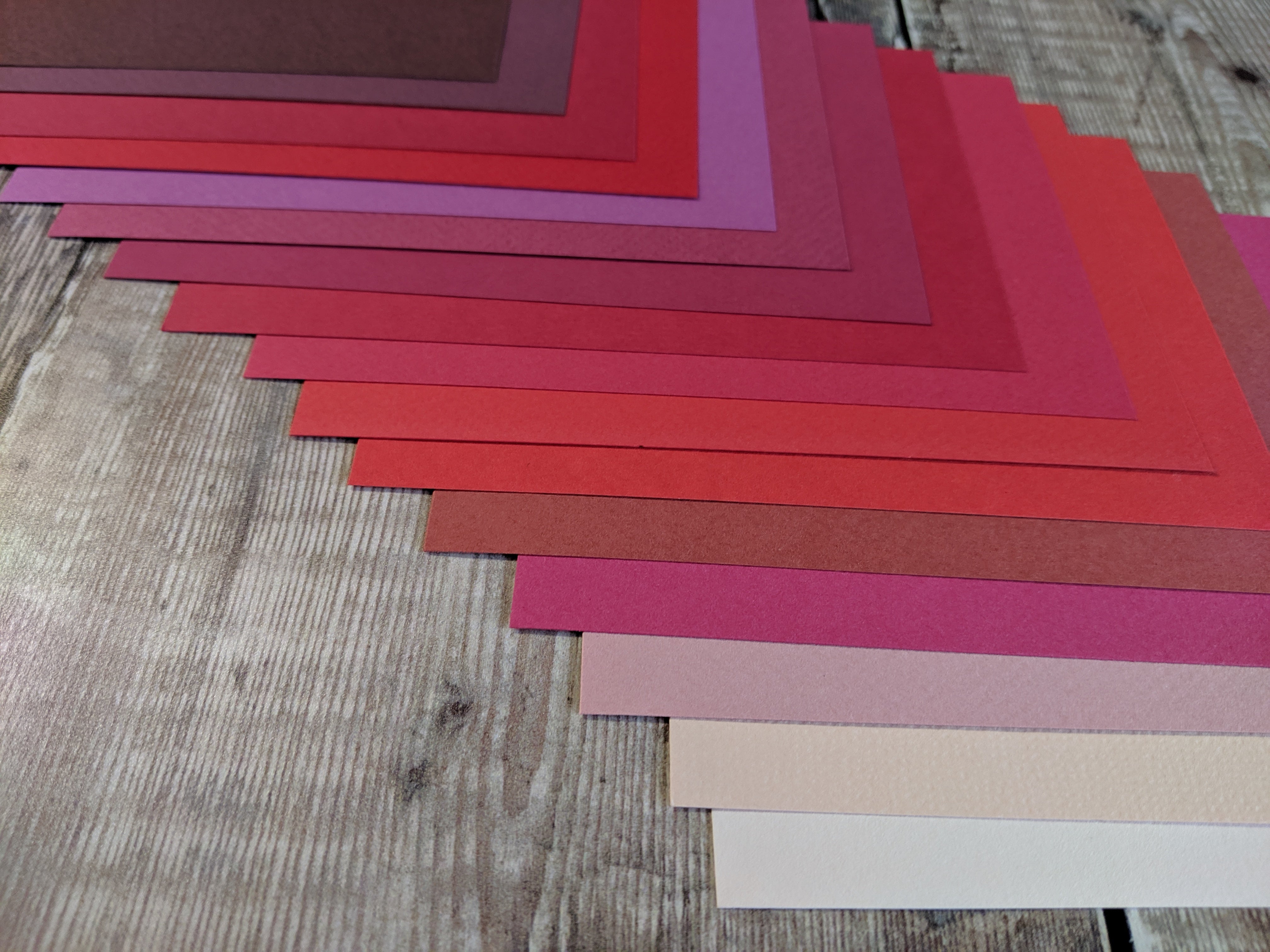 16  Layered pack of Red to Pink Hammered 160 gsm paper A4