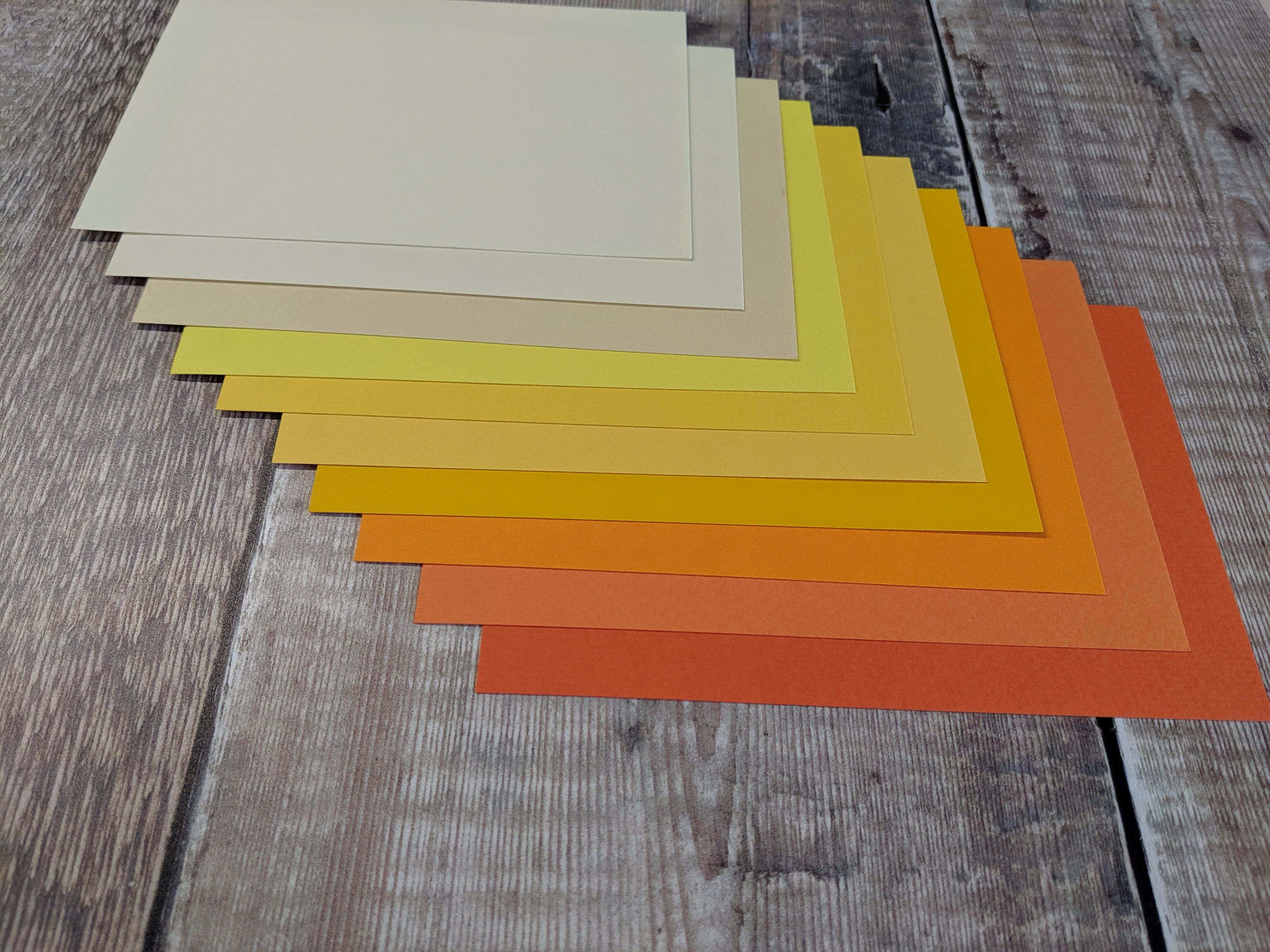 10 Layered pack of Orange tones A4 Hammered 160 gsm paper A4