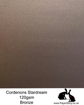 A4 Stardream 120gsm paper for Papercutting, craft, flower making  and wedding stationery. Bronze, is a stunning chocolate brown and has beautiful warm undertones with shimmering light reflection with a hint of gold. Stardream is a luxury Italian paper from Italy, it is a double sided quality Pearlescent paper with a matching colour core. FSC Certified, acid free, archival and PH Neutral