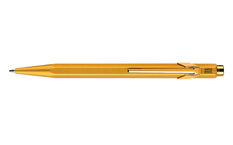 Caran d'Ache 849 Goldbar Ballpoint pen and holder paperstory uk