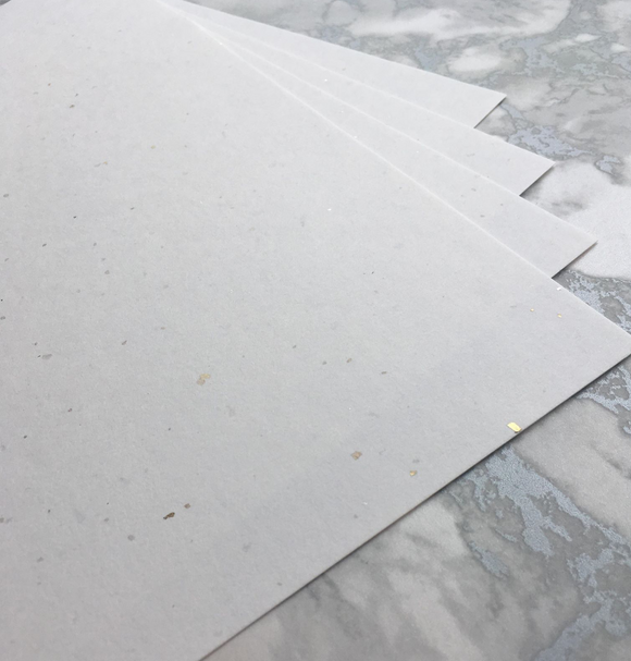 Gold and Silver Leaf 120 gsm specialist inclusion paper. Made using traditional methods to make, this is a wonderful and unusual paper contains randomised scattering of beautiful shimmering pieces of silver and gold leaf. 100% recycled and acid free, no bleach or acids are used during the making process. 